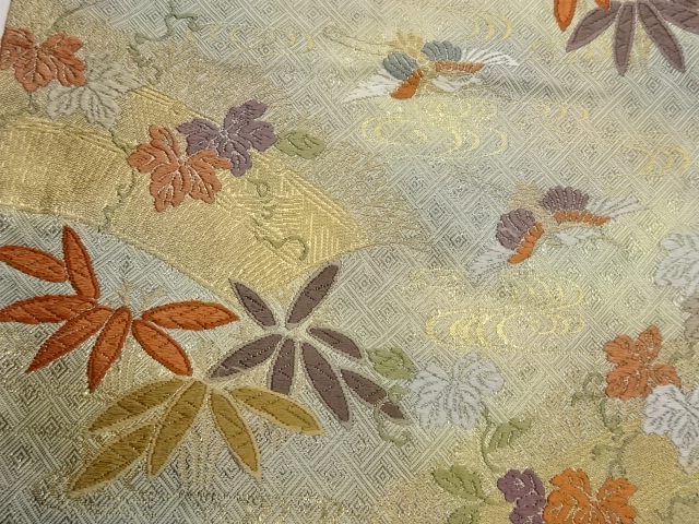  笹に蔓草・鶴・流水模様織出し袋帯